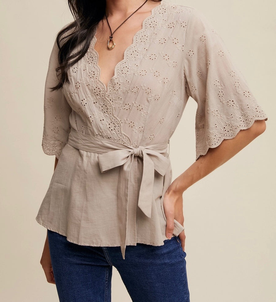 Embroidered Eyelet Wrap Peplum Top