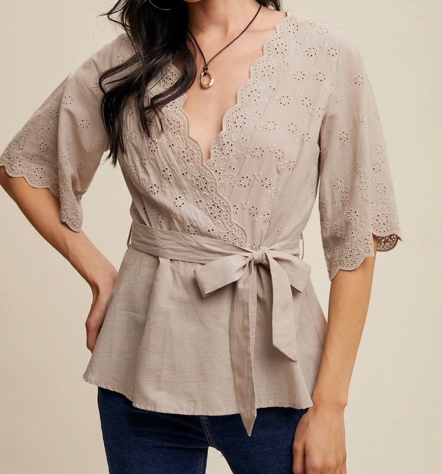 Embroidered Eyelet Wrap Peplum Top