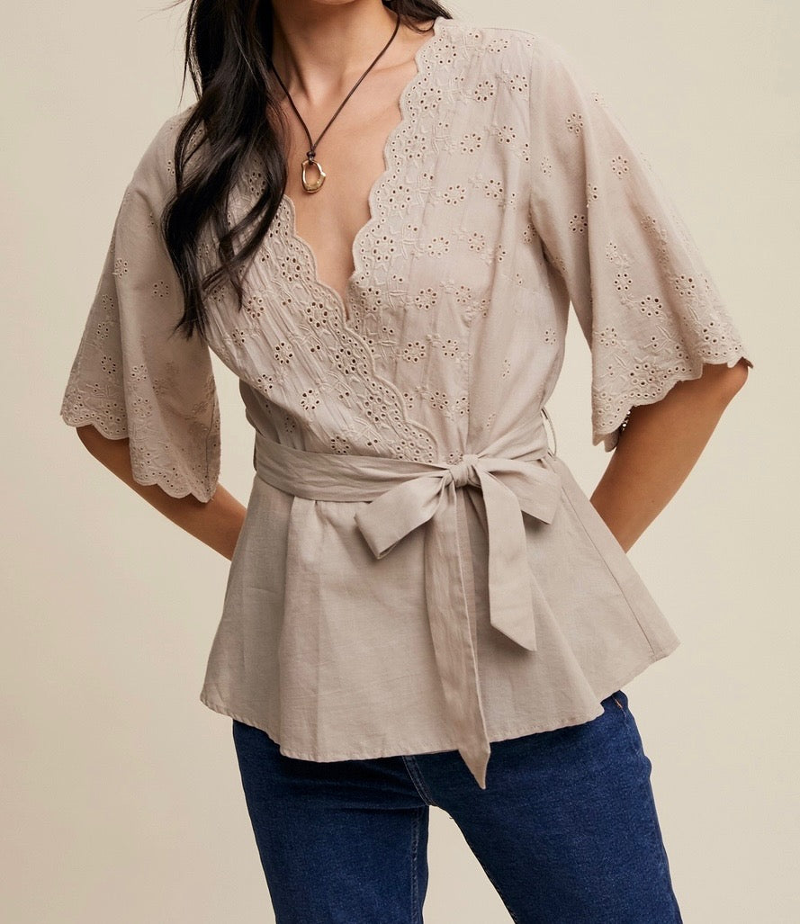 Embroidered Eyelet Wrap Peplum Top