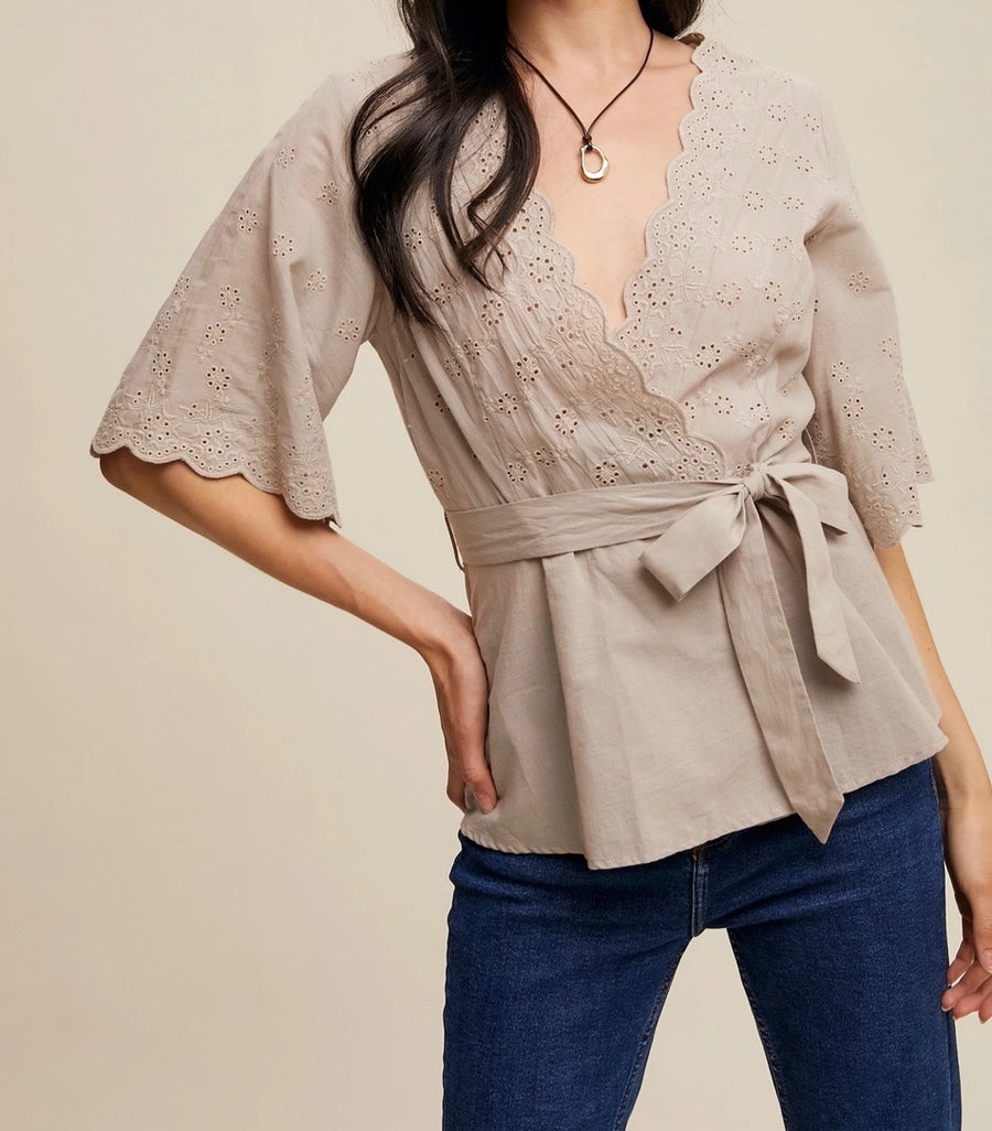 Embroidered Eyelet Wrap Peplum Top